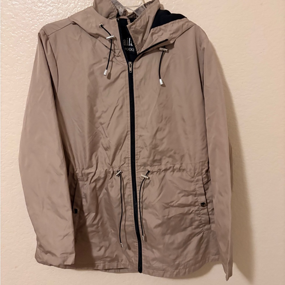 Details tan parka in a pocket size large